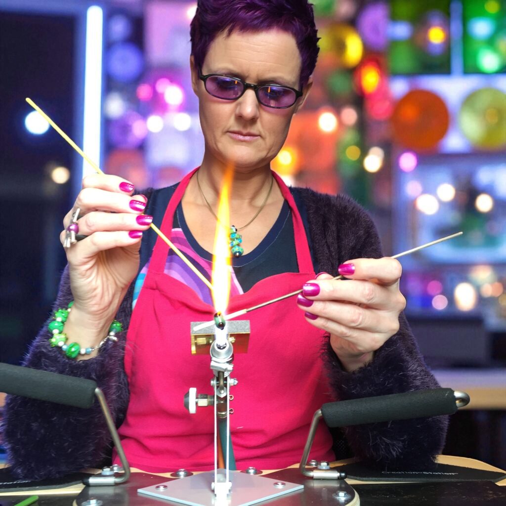 Jet with burner and glass in her atelier