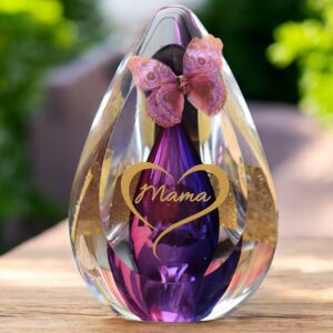 Glass design urn with pink-purple ash chamber and image of a gold-coloured heart in silhouette shape with space for a short name – suitable for cremation ashes.