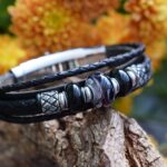 Black leather memorial bracelet with ashes bead and stainless steel clasp
