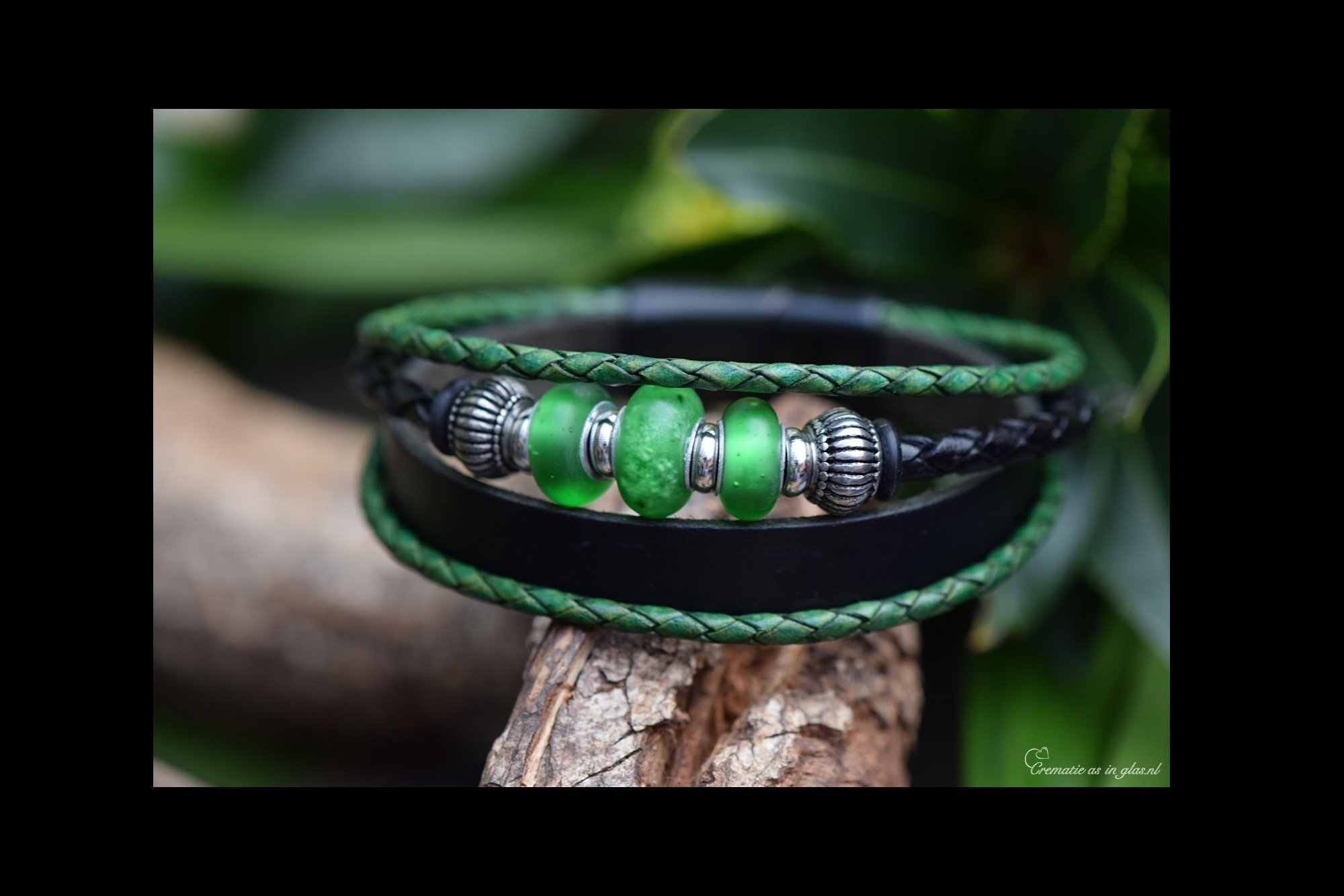 Memorial bracelet with matte green glass bead containing non-visible cremation ashes