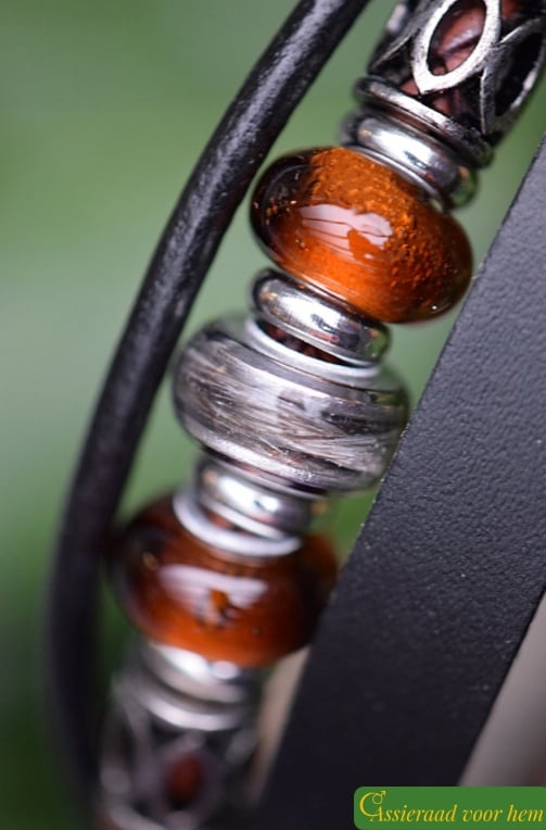 finished with black magnetic clasp.