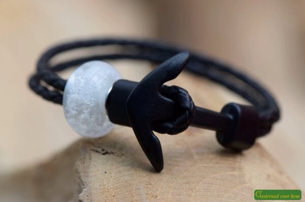 Double black leather bracelet with a transparent glass bead containing visible cremation ashes