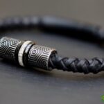 Leather bracelet with visible cremation ashes in stainless steel bead