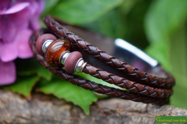 Brown leather memorial bracelet with transparent glass bead subtly containing cremation ashes