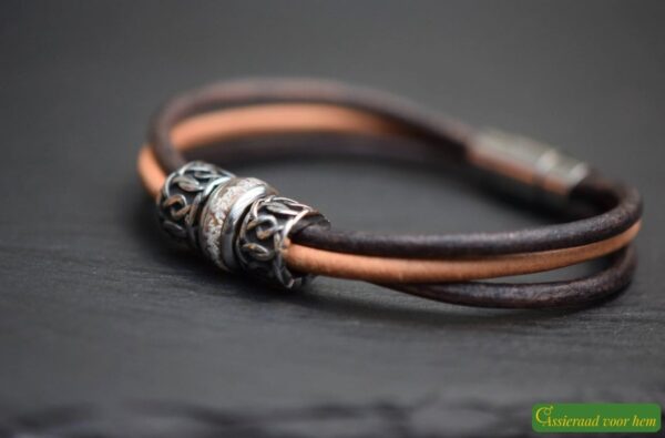 Memorial bracelet with stainless steel bead containing cremation ashes