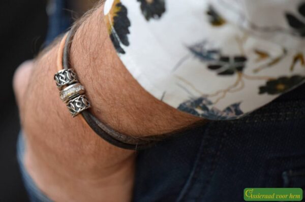 placed between vintage-style spacers and finished with a secure magnetic clasp.