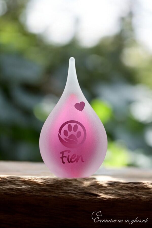Small frosted glass urn in pink with sandblasted paw-in-hand symbol