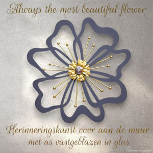 Large flower of black laser-cut metal with gold-colored stems and a gold-transparent glass center