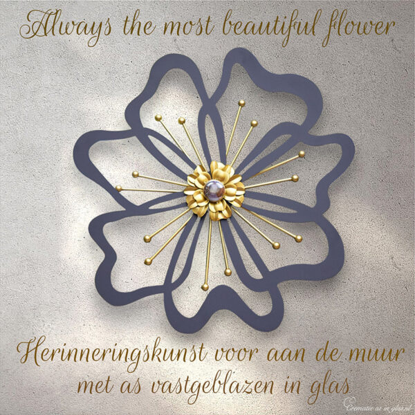 Large flower of black laser-cut metal with gold-colored stems and a gold-transparent glass center
