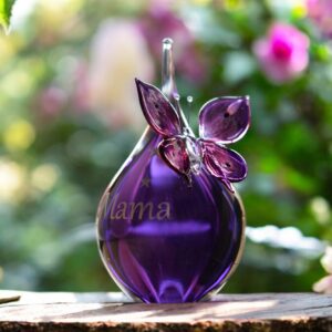 Urn and butterfly of purple transparent glass.