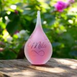 Urn of pink and blue glass.