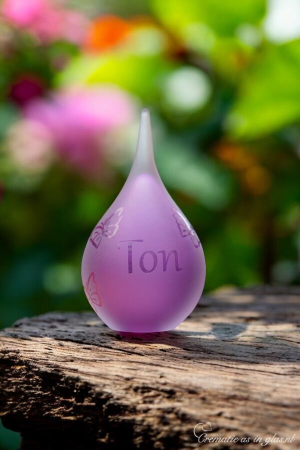 Urn of purple glass. Cremation ash urn glass personalized to keep as a precious memory