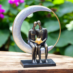 Two figures seated in moon-sun circle