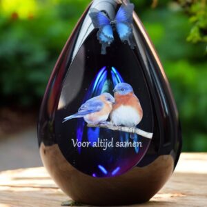 Glass design urn with blue ash chamber and image of two birds with the text Together forever – suitable for cremation ashes.