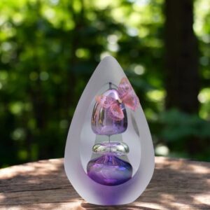 Handmade glass urn in purple with air bubbles