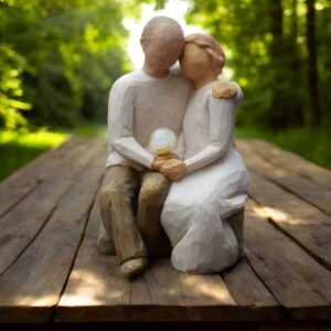 Willow Tree figurine Anniversary couple sitting close together holding mini urn for ashes or a lock of hair