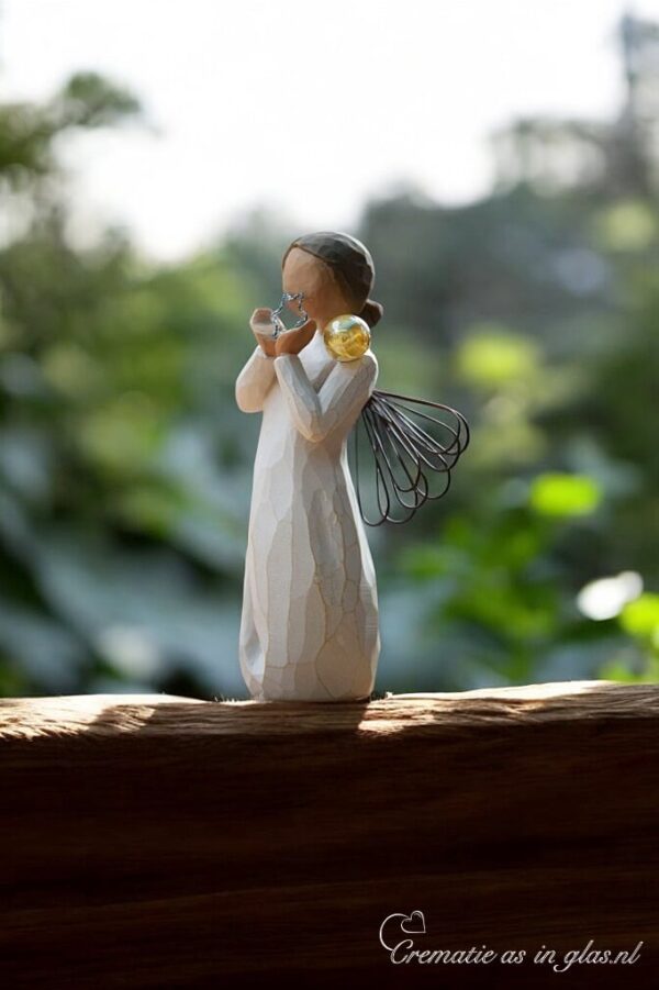 Willow Tree figurine Bright Star angel with metal wings holding green heart and mini urn for ashes or a lock of hair