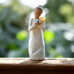 Willow Tree figurine Nurture girl holding small bird with mini urn for ashes or a lock of hair