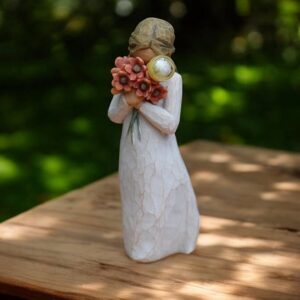 Willow Tree figurine Surrounded by Love woman holding red flowers with mini urn for ashes or a lock of hair