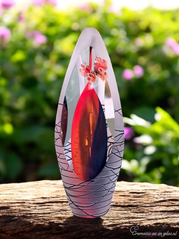Design urn made of glass with orange-black ash chamber