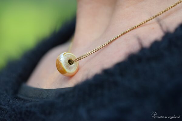 and 14k gold core on gold chain.