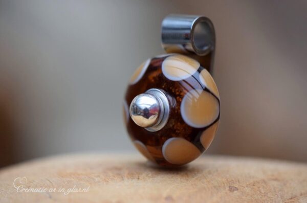 Memorial pendant with subtle ashes in dark brown dotted glass and 925 sterling silver bail