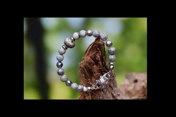 Men’s memorial bracelet with Picasso jasper beads and non-visible ashes in a matte handmade glass bead.