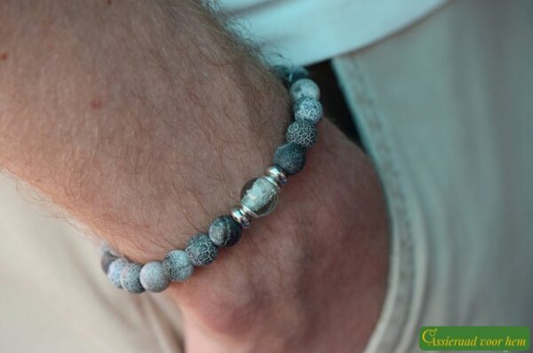 Men’s memorial bracelet with grey chalcedony beads and semi-visible ashes in a transparent grey glass bead.