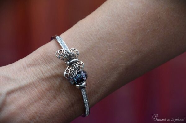 and sterling silver butterfly charm.