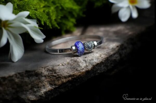 Memorial bangle with invisible ashes in cobalt blue glass and sterling silver ‘Mother Daughter’ charm