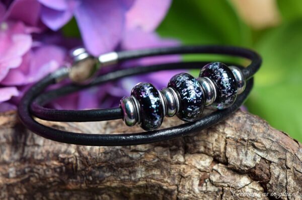 Leather memorial bracelet with invisible ashes in black shimmer glass bead and matching decorative beads