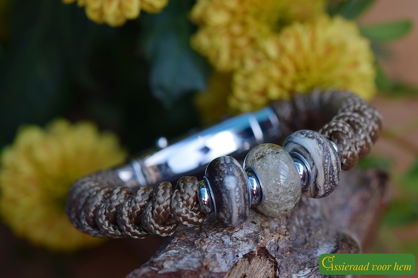 Men’s memorial bracelet in brown Sailrope with brown cremation ashes glass bead between two sandblasted mottled beads.
