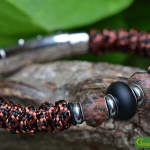 Knotted men’s bracelet with black and red sail rope and a black glass bead