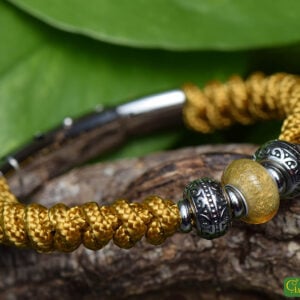 Knotted men’s bracelet with ochre yellow sail rope and a transparent yellow glass bead