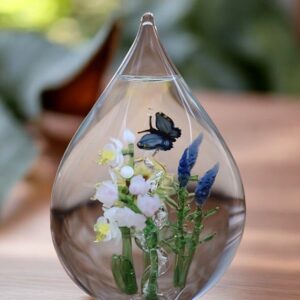 Glass urn large model with field bouquet of magnolia