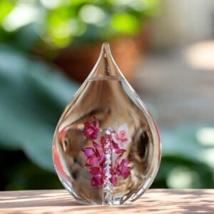 Glass urn with hollow compartment