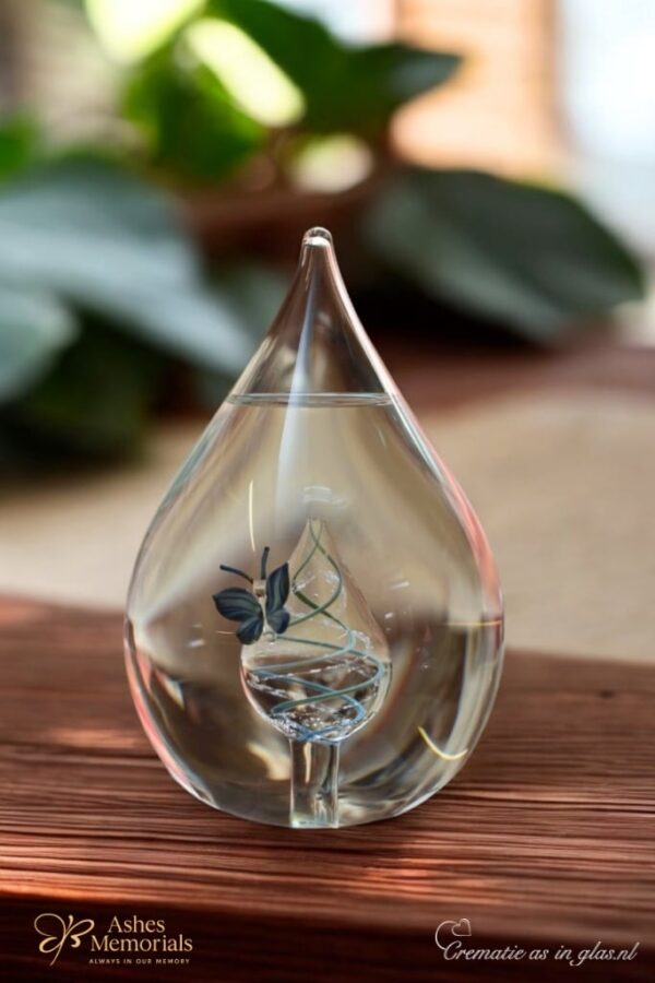 Glass urn large model with drop shape and blue butterfly