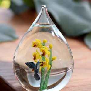 Glass urn large model with yellow orchids and hummingbird