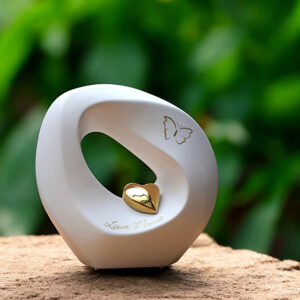 Infinity urn in white with a golden heart