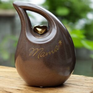 Slanted tear urn in brown color with gold heart