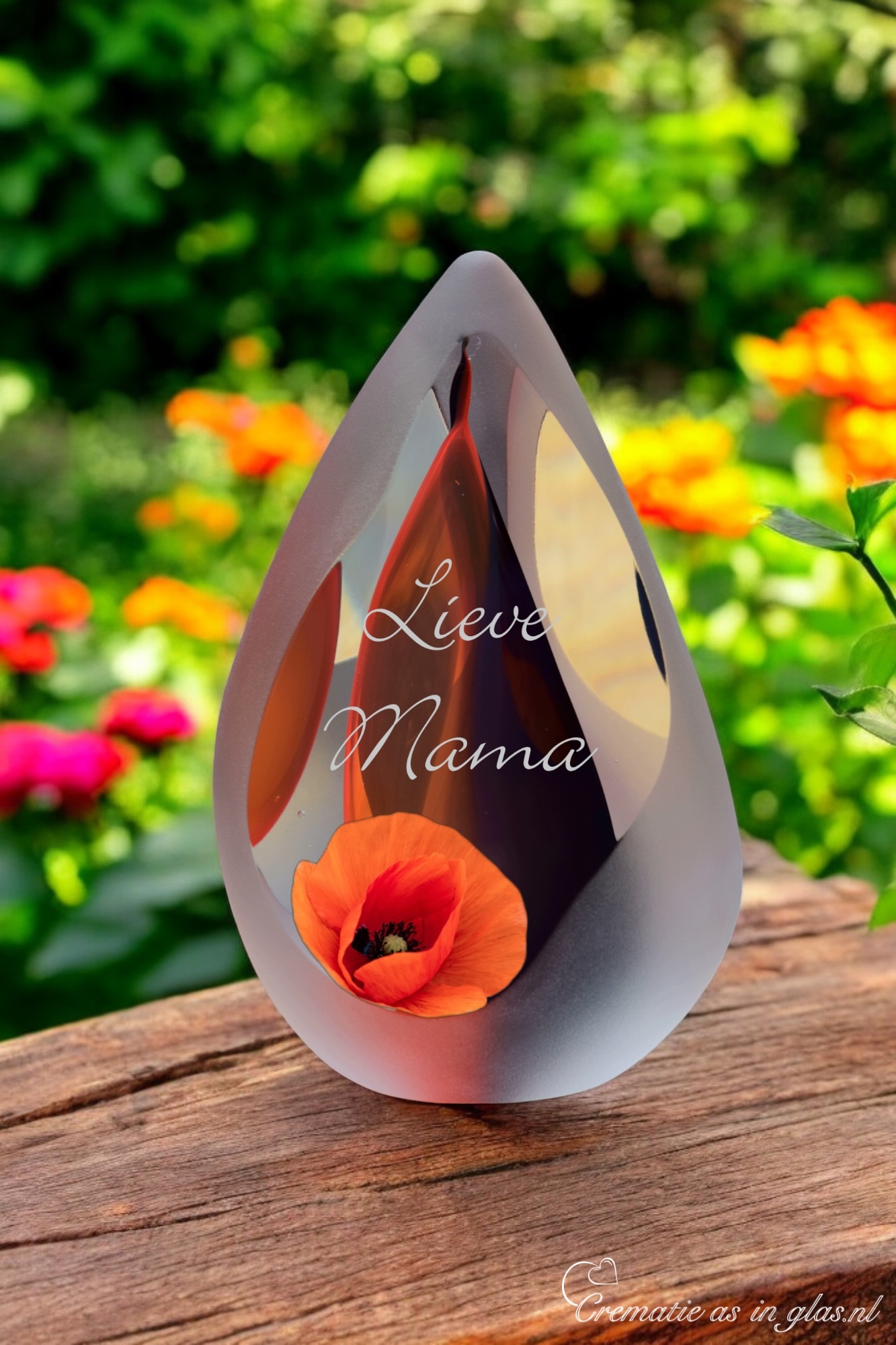 Glass design urn with transparent orange-black ash chamber and image of an orange poppy – suitable for cremation ashes.