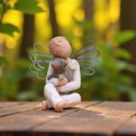 Willow Tree figurine Angel of Comfort with boy angel holding dog and glass mini urn on shoulder