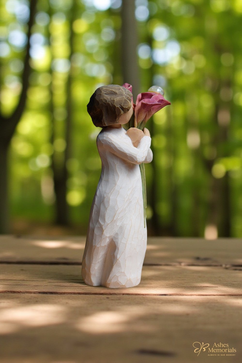 with glass mini urn for ashes or lock of hair.