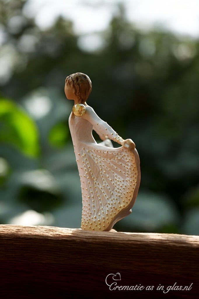 Willow Tree figurine Butterfly girl with wide butterfly dress and golden accents holding mini urn for ashes or a lock of hair