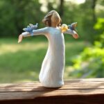 Willow Tree figurine Happiness girl surrounded by birds with mini urn for ashes or a lock of hair