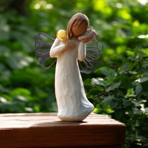 Willow Tree figurine Thinking of You girl holding seashell to ear with mini urn for ashes or a lock of hair