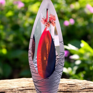 Design urn made of glass with orange-black ash chamber