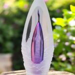 Design urn made of glass with purple-pink ash chamber