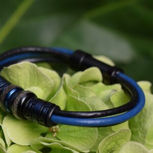 Black and blue leather men’s memorial bracelet with double ashes keepsake and metallic blue design beads.