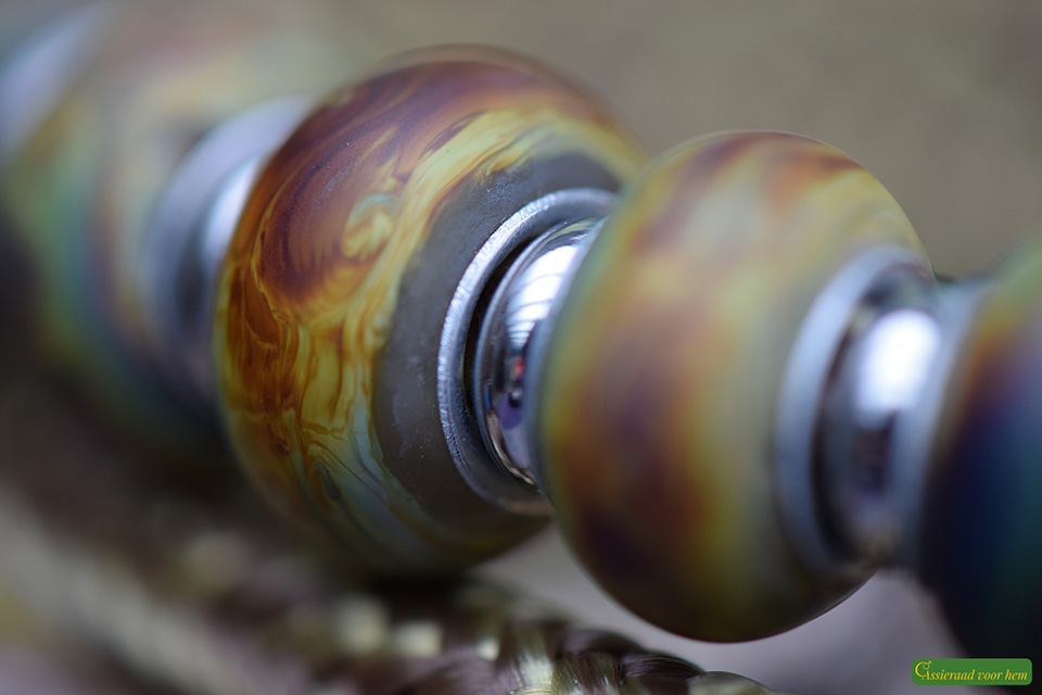 photographed among flowers.